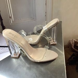 Clear high heels.